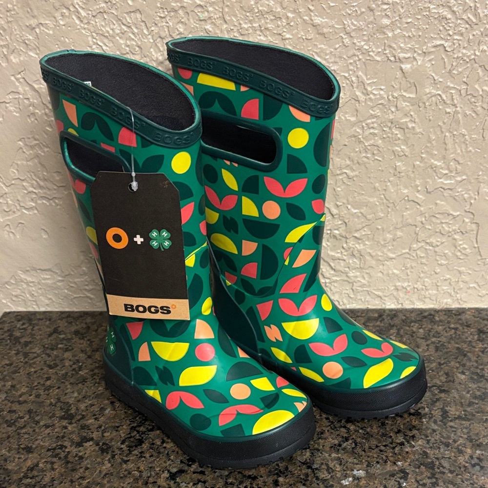 Bogs Green Kids Rain Boots with Yellow and Pink Leaf Pattern 4 H edition.